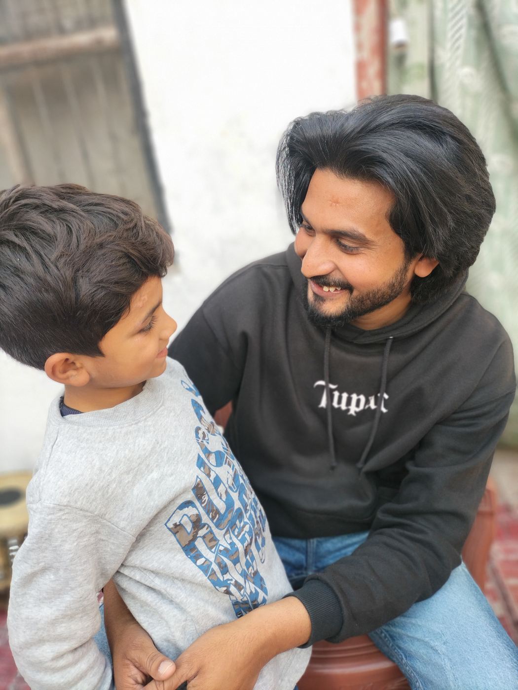 Our missionary hugging a young orphan